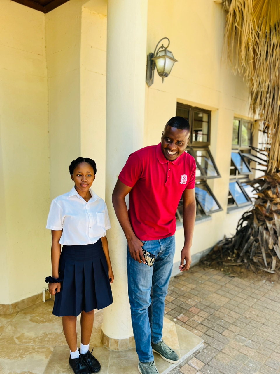 Mr Shumba with a student